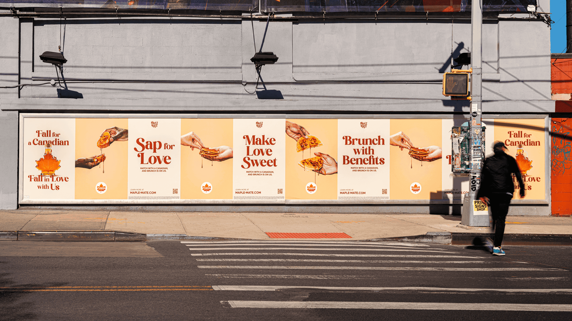 Outdoor banner promoting Maple Mate with slogans and branding elements.